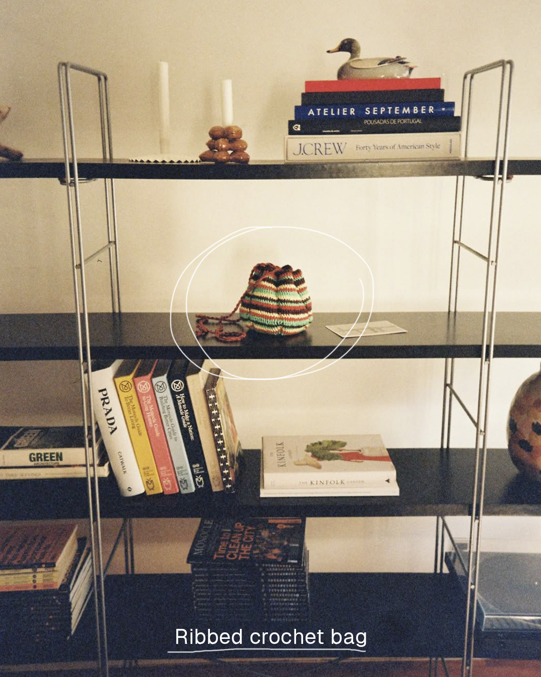 Ribbed crochet bag styled on a bookshelf